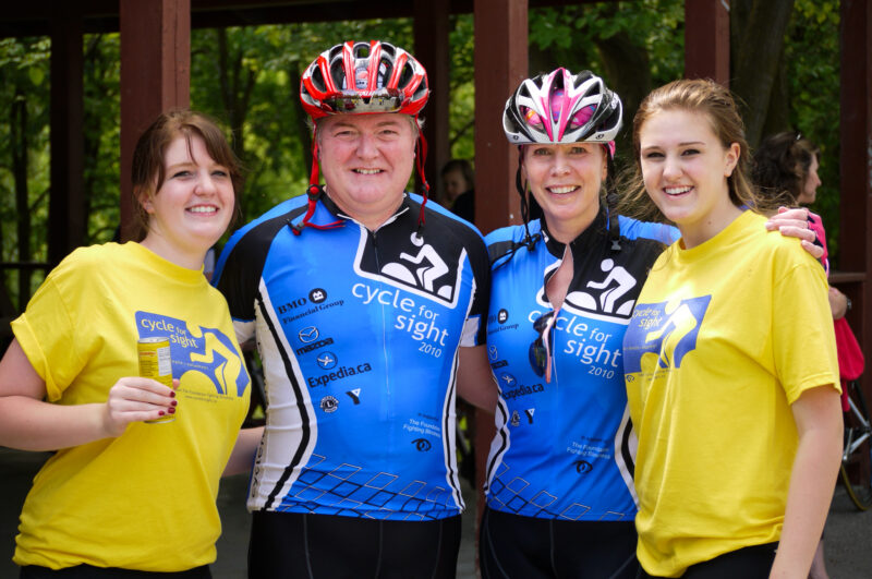 Dave poses with his wife Donna and their two children Michelle and Christine