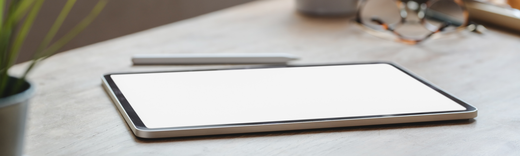 photo of an ipad on top of desk