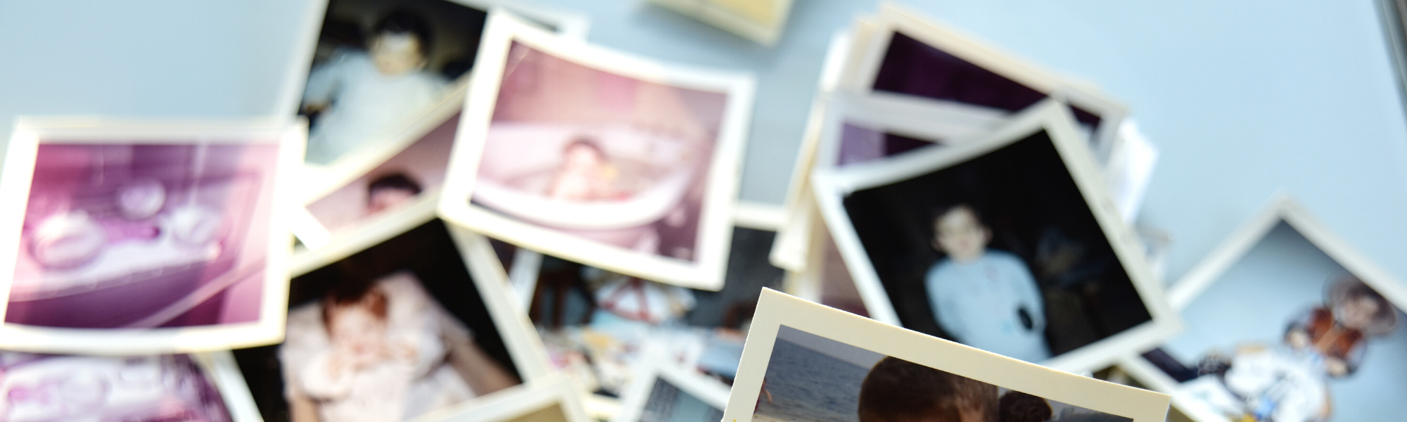 image of photos scattered on a table