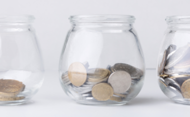 image of three jars filled with coins