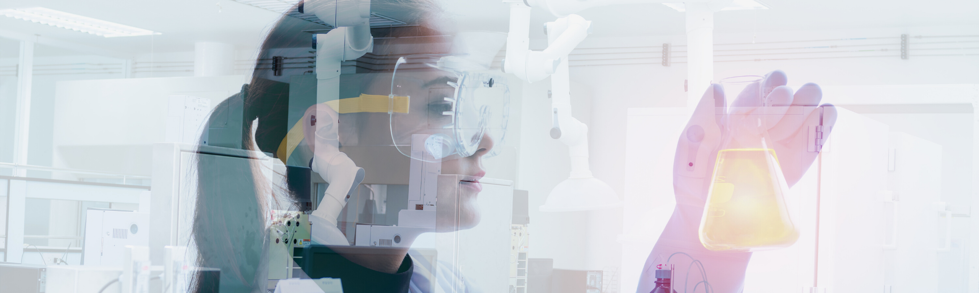 image of female scientist holding lab tools