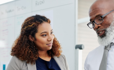 image is of a mentor and mentee speaking