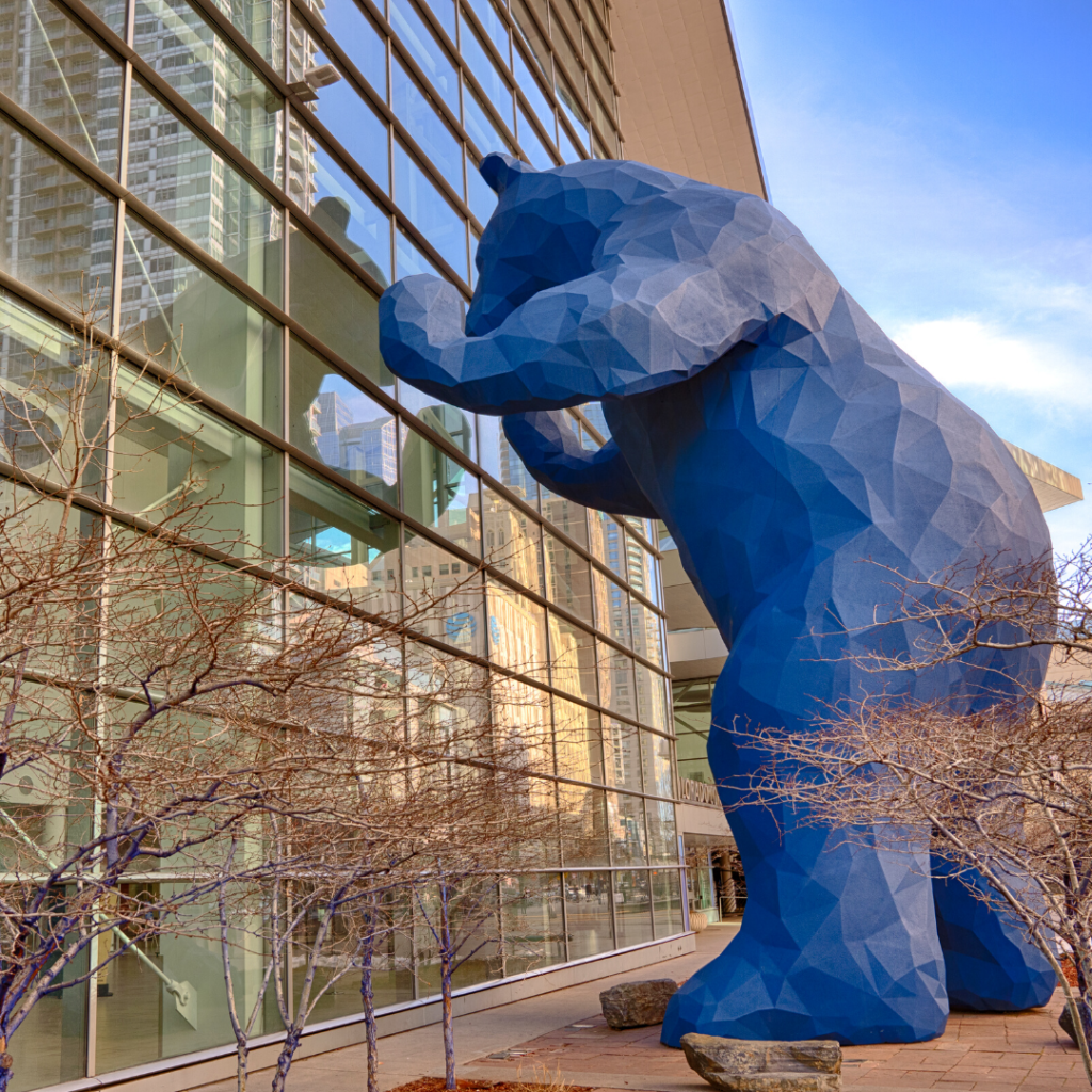 Image is of a large bear statue that overlooks the Denver Conference Center in Denver