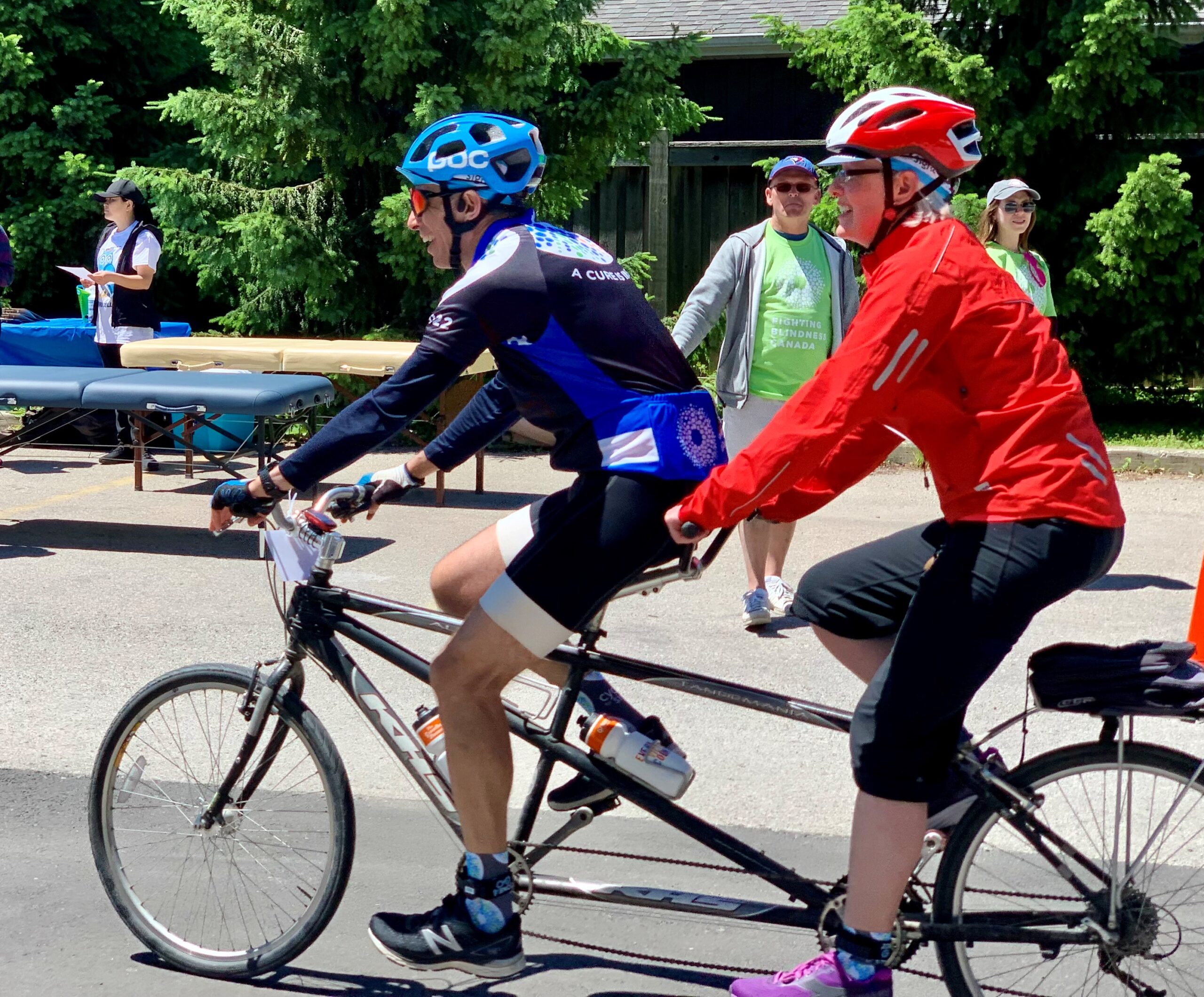 Image is of two bikers riding during Cycle For Sight event