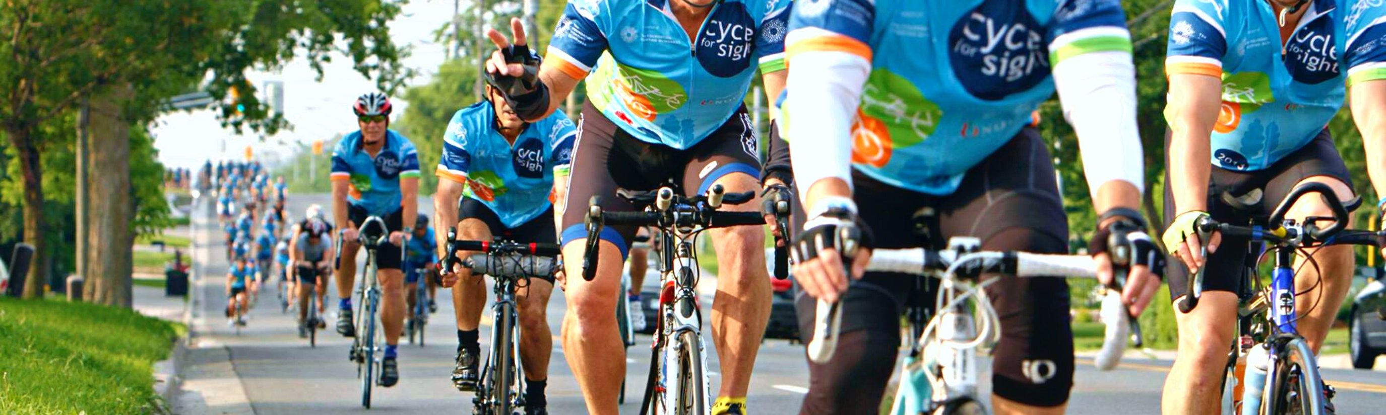 Image is of a group of cyclists during the Cycle for Sight event in 2022.