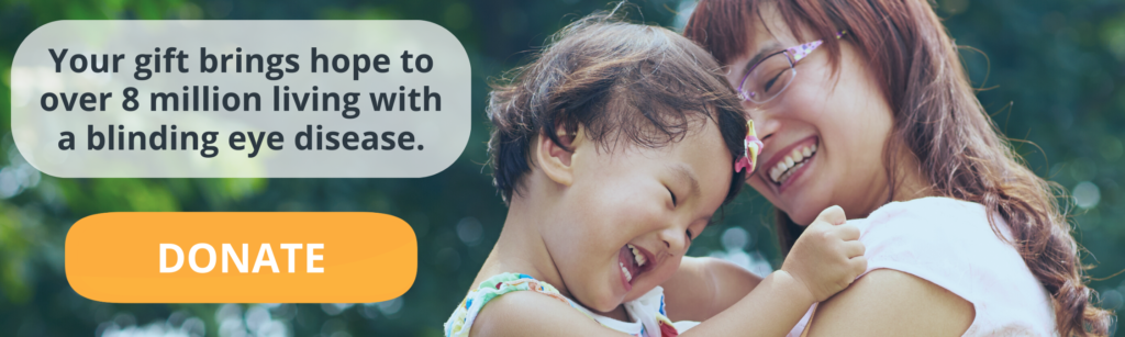 An image of a mother and a young daughter with text overlaid on the image that states, "Your gift brings hope to over 8 million living with a blinding eye disease. Donate."