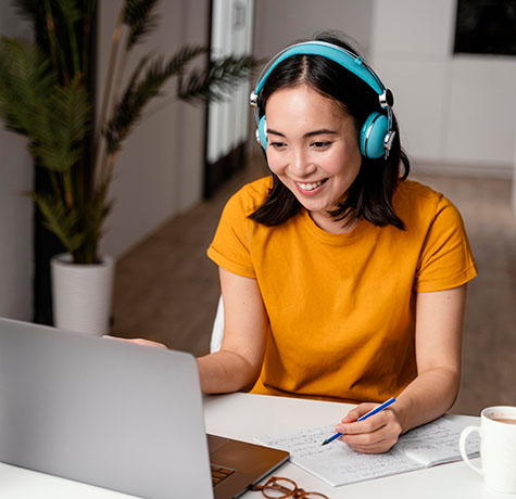 woman attending webinar via her laptop