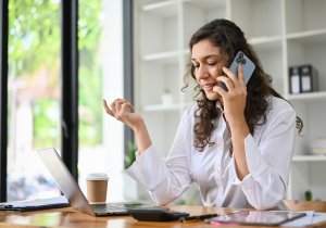 A young woman on a phone.