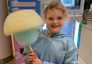 Young girl with cotton candy