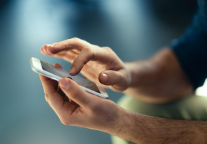 Close up of hands using a smartphone