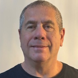 Headshot of Wayne St. Denis in a black shirt