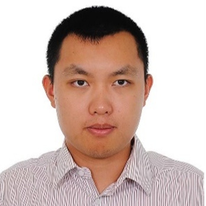 Headshot of Billy Liu wearing a striped shirt