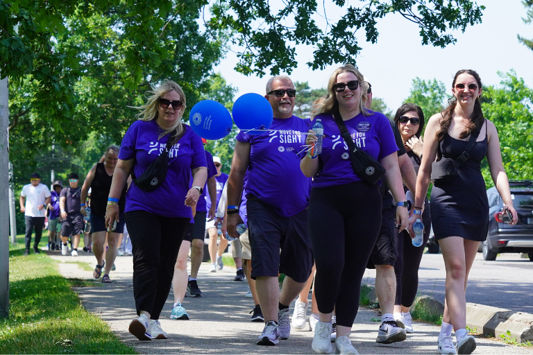 A MOVE FOR SIGHT team walking