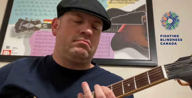 man playing guitar